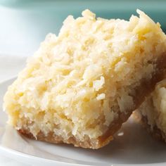 two pieces of cake sitting on top of a white plate