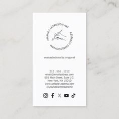 a business card with an image of a hand holding a cross on it's side