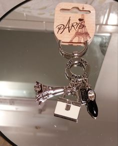 a keychain that has some charms attached to it