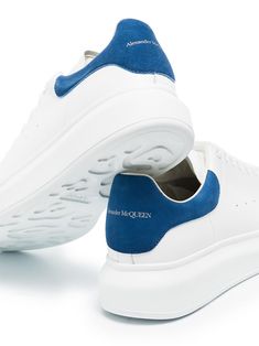 White and sapphire blue Made from leather Logo print heel counters Perforated sides Logo tabs at tongues Lace-up front fastenings Chunky rubber soles Crafted in Italy Size Info IT Color Detail Blue Made In Italy Material Lining: Calf Leather 100% Outer: Calf Leather 100% Sole: Rubber 100% Season One Fall-Winter Season Two Fall-Winter Product sneakers Brand Alexander Mcqueen Size And Fit Heel 1,8 in / 4,5 cm; Platform 1,4 in / 3,5 cm Blue Calf Leather Sneakers With Contrast Sole, Classic Blue Calf Leather Sneakers, Classic Blue Sneakers With Textured Sole, Blue Low-top Calf Leather Sneakers, Blue Sneakers With Rubber Heel Cap For Sports, Blue Sneakers With Leather Sole And Round Toe, Blue Sneakers With Rubber Heel Cap, Blue Sneakers With Leather Sole For Streetwear, Blue Low-top Sneakers With Leather Sole