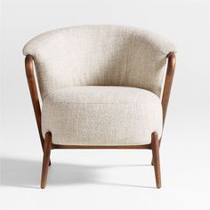 an upholstered chair with wooden legs and a cream colored fabric seat, viewed from the front