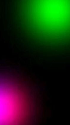 a blurry image of three different colored lights