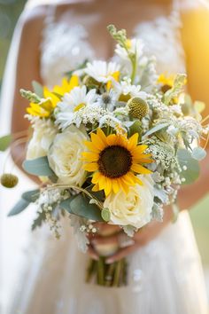 Fall in love with these 87 sunflower wedding bouquets. Perfect for adding a touch of sunshine to your special day! #SunflowerWedding #BouquetInspo #WeddingIdeas Click to see them all! Sunflower Bridesmaid Bouquet, Fall Sunflower Weddings, Wildflower Weddings, Country Decorations, Real Wedding Flowers, Sunflower Wedding Decorations, Wildflower Wedding Bouquet, Bridal Bouquet Peonies, Tulip Wedding