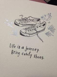 a drawing of two shoes with the words life is a journey, bring comfy shoes