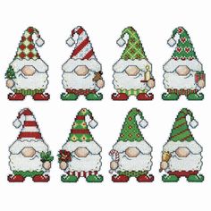 cross stitch christmas gnomes with hats and candy canes on their heads, all in different colors