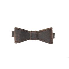 a brown leather bow tie on a white background