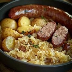 sausage, potatoes and sauerkraut in a skillet