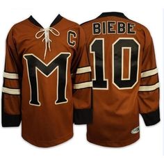 a hockey jersey with the number 10 on it and an inscription that reads'c biebe '