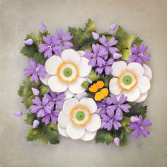 purple and white flowers are arranged in a square arrangement with green leaves on the side