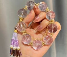 Material:Amethyst Quartz beads The accessories are alluvial gold. 14k gold-plated and inlaid with zircons. hand circumference around 16mm size :  18mm quantity: one strand  6mm approx 29 pcs one strands 7mm approx25 pcs one strands 8mm approx 22 pcs one strands 9mm approx 21pcs one strands 10mm approx 19 pcs one strands 11mm approx 18pcs one strands 12mm approx 16 pcs one strands 13mm approx 16 pcs one strands 14mm approx 15 pcs one strands 15mm approx 14pcs one strands 16mm approx 14 pcs one st Elegant Gold Amethyst Crystal Bracelet, Purple Crystal Beaded Bracelets As Gift, Gold Beaded Amethyst Bracelets, Luxury Gemstone Beaded Bracelets As Gift, Elegant Amethyst Crystal Bracelet With 8mm Beads, Gold Amethyst Jewelry With 8mm Beads, Luxury Purple Jewelry With Round Beads, Luxury Round Crystal Bracelet As Gift, Beaded Amethyst Crystal Bracelet Gift