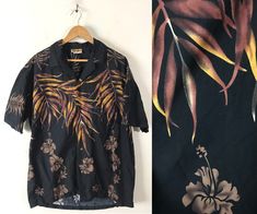 "-Description- >men's black & brown floral leaf print hawaiian shirt >button front >collared >open pocket on the front >size XL >cool shirt! >condition: very good >color(s): black, brown >fabric(s): 100 cotton >brand: winnie fashion >care: machine wash -Measurements- >size: XL ✩ all measurements are taken with the item laying flat & some sizes are estimates so please check measurements ✩ chest: 50\" / 127cm length: 29.5\" / 75cm shoulder to sleeve end: Black Shirt With Tropical Print And Camp Collar, Black Tropical Print Shirt With Camp Collar, Black Hawaiian Shirt With Tropical Print, Black Tropical Hawaiian Shirt With Camp Collar, Black Hawaiian Camp Shirt With Tropical Print, Black Tropical Shirt With Tropical Print, Black Hawaiian Floral Print Top, Black Tropical Print Shirt, Black Tropical Camp Shirt