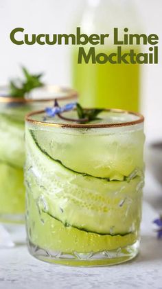 cucumber lime cocktail in glasses with blue flowers on the rim and text overlay that reads cucumber lime cocktail