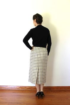 A gorgeous 50s style pencil skirt from the 1980s! Just beautifully made by JH Collectibles in a lovely creamy white with black and tan striped rayon/silk blend. High waist with back zipper and hook closure. Belt loops for your favorite belt! Hits mid-calf. Kick pleat for movement. Fully lined in a creamy white acetate. Excellent condition! Tagged a size 8. Fits best on a modern size small. Measurements Waist 27 inches Hips 40 inches Length 31.5 inches Thank you for looking and please feel free t Fitted Pleated Skirt In 1950s Style, 1950s Style Fitted Pleated Skirt, Fitted Pleated Skirt In Vintage Style, Vintage Pencil Skirt For Fall, Retro Pencil Skirt For Workwear, Retro Pencil Skirt For Work, Retro Relaxed Skirt For Workwear, Retro Relaxed Workwear Skirt, Vintage Long Skirt For Work