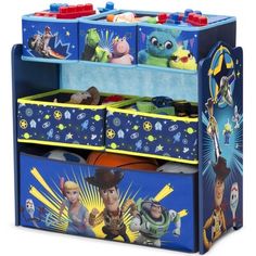 the toy chest is filled with toys and has characters on it, including buzz lightyear