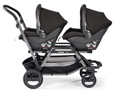 two baby strollers sitting next to each other