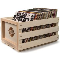 a wooden crate filled with lots of records