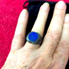 Men’s/Unixex Lapis Lazuli Signet Ring In Size 11 In Blackened Sterling Silver. This Ring Features A Lapis Lazuli Slice With A Diameter Of 14.36mm And Weighs 22.1 Grams. This Is A Bicocchi Signature Piece And Really Stands Out As A Unique Ring. The Blackened Silver Eliminates The Constant Cleaning Often Required By Silver. The Band Width Is 6.5 Mm And The Ornament Width Is 18.2 Mm In Ring Size 11! Five Star Rated Seller Where Customer Satisfaction Is Number One Consideration! Reasonable Offer Pls Mens Accessories Jewelry, Unique Ring, Five Star, Signet Ring, Unique Rings, Lapis Lazuli, Number One, Customer Satisfaction, Ring Size