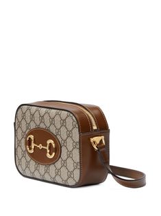 Monogram Canvas Crossbody Shoulder Bag With Gold-tone Hardware, Gucci Travel Shoulder Bag With Horsebit Detail, Gucci Shoulder Bag With Horsebit Detail For Travel, Classic Gucci Bags With Gold-tone Hardware, Travel Shoulder Bag With Horsebit Detail, Gucci Travel Bag With Horsebit Detail, Gucci Beige Signature Coated Canvas Bag, Beige Gucci Bags In Coated Canvas, Travel Satchel Shoulder Bag With Horsebit Detail