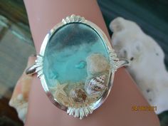 Resin Ocean Artwork Silver Plated Adjustable Cuff Bracelet with a Real Starfish, Genuine Caribbean Pink Beach Sand, Shells and Rocks. Ocean Bracelet, Ocean Artwork, Mermaid Crafts, Resin Bracelet, Sea Shell Decor, Ocean Jewelry, Sea Pottery, Pink Beach, Diy Resin Art