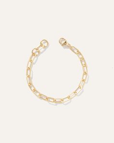 Statement-making yet simple. This is the bracelet you’ll turn to when you want a bold look that does it all—from dressing up jeans and a T-shirt to completing any workwear style. Expertly crafted and justly priced, it’s an instant classic that’s designed to last.  | Quince | Women's Bold Paperclip Chain Bracelet in Gold Vermeil Everyday Metal Chain Bracelet With Extender, Trendy Chain Bracelet With Extender, Everyday Paperclip Chain Bracelet With Lobster Clasp, Everyday Gold Chain Paperclip Bracelet, Dressing Up Jeans, Paperclip Bracelet, Dress Up Jeans, Workwear Style, Silver Coat