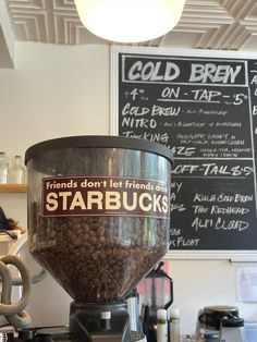 a coffee grinder sitting on top of a counter