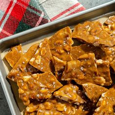 Salted Caramel Peanut Brittle Recipe - Magnolia Magnolia Table Recipes, White Chocolate Peppermint Bark, Joanna Gaines Recipes, Joanna Gaines Magnolia, Holiday Candy Recipes, Peanut Brittle Recipe, Chocolate Peppermint Bark, Honey Roasted Peanuts, Brittle Recipes