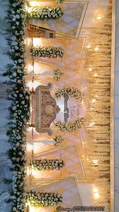 an overhead view of a wedding ceremony with flowers on the aisle and lights in the background