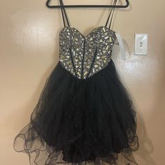 Size 1/2 For Juniors/Middle School Dance Brand New. Tags Still Attached. Never Worn!!! Amazing, Perfect Condition!!! Can Be Good For Any Formal Dance Homecoming, Winter Formal, Valentines, & More Short Formal Dress Beautiful Diamond Embellished Corset Top Black Tulle Fabric At The Bottom Laces Up In The Back Includes Extra Rhinestones In Case You Lose Any Purchased For $200 On Promgirl.Com 100% Polyester Lining Dave & Johnny Brand #Lbd #Diamomd #Rhinestone #Bling #Boujee #Formal #Dance #Homecomi Black Dress For Dance, 90s Formal Dress, Dress For Dance, Black Tulle Fabric, Royal Blue Evening Gown, 2 Piece Formal Dresses, Embellished Corset, Corset Top Black, Middle School Dance