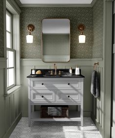 a bathroom with two sinks and a large mirror