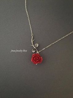 Sweet red rose and silver branch necklace. Very dainty but sturdy. Silver branch and red rose are on an 18'' stainless steel chain with lobster clasp. *Stainless steel chain *Silver brass branch *15mm resin rose *Handmade with love <3 Also available as a bracelet https://www.etsy.com/listing/665169824/silver-branch-and-red-rose-bracelet-rose?ref=shop_home_active_1 Like Jmesjewelrybox on Facebook for updates on new jewelry, upcoming sales and giveaways! Plus Facebook fans save 5% :D Find the c Beauty And The Beast Necklace, Rose Branch, Collar Rosa, Pretty Heels, Resin Rose, Branch Necklace, Unique Pendant Necklace, Rose Bracelet, Necklace Red