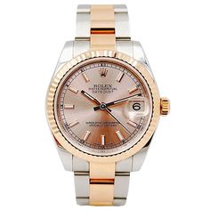 Ladies Rolex 31mm Midsize DateJust Two Tone 18K Rose Gold / Stainless Steel Watch with Pink Dial and Fluted Bezel. Pre-Owned SN# 07Y**** Year: 2016. Brand: Rolex. Bezel: Fluted. Dial Color: Pink. Crystal: Sapphire. Gender: Women's. Condition: Very Good. Case Dimensions: 31mm. Movement: Self-Winding (Automatic). Metal Type: 18K Rose Gold / Stainless Steel. Bracelet / Strap: 18K Rose Gold / Stainless Steel. Box / Certificate: Includes Rolex Box / Rolex Card. Service Warranty: One (1) Year Limited Rose Gold Jewelry And Watches For Formal Occasions, Elegant Pink Watches With Date Indicator, Elegant Pink Watch With Date Indicator, Elegant Pink Watch With Date Display, Diamond Watch With Date Display For Gift, Patek Philippe Mens, Zenith Watches, Rolex Watches Women, Rolex Women