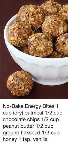 a bowl filled with no bake energy bites on top of a table