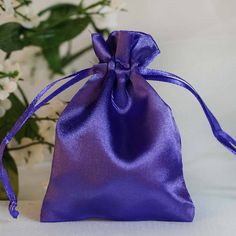 "View All Colors : https://etsy.me/3li6E8D Quantity: 12 Satin Bags Material: Satin Color: Purple Height: 4\" Width: 3\" Thickness: 90 GSM Fillable Size: 3\" x 3.5\" Perfect for packaging jewelry, candies, or gifts. Drawstring Pouch Wave like modish pattern coupled with rustic burlap hue and texture give these favor bags a classic whimsical appeal. Pack wine bottles, decorative jars or pots, pillar candles, and other sweet surprises and secure with two double pull ribbon knots at the end for safe Purple Swag, Purple Wedding Decorations, Peacock Party, Satin Pouch, Handmade Candy, Candy Jewelry, Muslin Bags, Wedding Favor Bags, Small Gift Bags