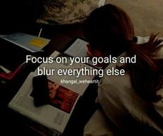 a woman sitting on a couch reading a book with the caption focus on your goals and blur everything else