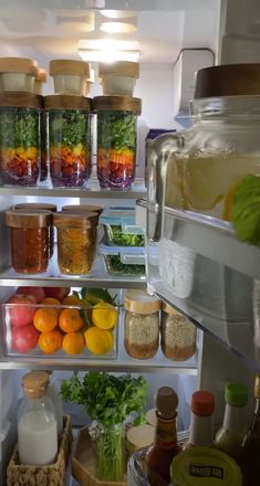 an open refrigerator filled with lots of food