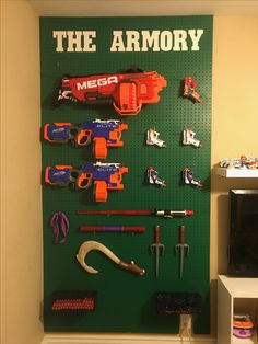 the wall is filled with legos, tools and magnets to make it look like an army