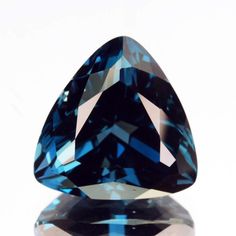 a large blue diamond sitting on top of a table