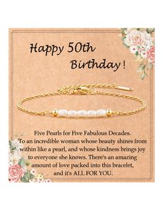 a birthday card with a gold chain bracelet and pearls on the clasp, saying happy 50th birthday