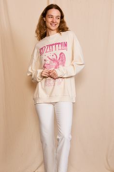 Get star struck with this Led Zeppelin 1977 sweatshirt! Crafted with super soft organic cotton, this relaxed crew neck sweatshirt will keep you cozy while you rock out to your favorite band. Perfect for any music lover, this sweatshirt is a must-have addition to your wardrobe. Color: Off-White Fabric: Organic Cotton Model wears a small Tumble dry on low Casual Long Sleeve Sweatshirt For Concert, Relaxed Fit Graphic Print Sweatshirt For Concert, Trendy Relaxed Fit Sweatshirt For Concert, Relaxed Fit Sweatshirt With Screen Print For Concert, Oversized Casual Sweatshirt For Concerts, Relaxed Fit Long Sleeve Sweatshirt For Concerts, Long Sleeve Relaxed Fit Sweatshirt For Concerts, Casual Crew Neck Sweatshirt For Concert, Cotton Sweatshirt For Fall Concerts