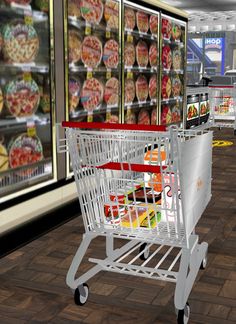 a shopping cart in a grocery store filled with food