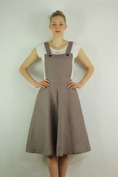 "Handmade coffee dress sleeveless and 2 pockets , perfect for casual wear and suitable for any occasion in any season Details: - 100% natural linen produced in Europe ; - medium weight (180 gram per square meter); - color: coffee, could be any from our colors catalog (color samples at the photo); Made to order, approximately a few days, If you have any questions please message me and I will be glad to answer. Size guide : Size XS Bust: fits bust around 33\"-34\"/ 84-88 cm Waist: fits waist aroun Brown Sundress With Adjustable Straps, Casual Sleeveless Brown Pinafore Dress, Knee-length Pinafore Dress With Pockets, Casual Brown Sleeveless Pinafore Dress, Sleeveless Beige Pinafore Dress For Spring, Beige Linen Dresses With Adjustable Straps, Casual Brown Pinafore Dress For Spring, Casual Brown A-line Sleeveless Dress, Brown Linen Dresses With Pockets