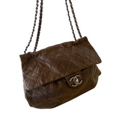 Description: Chanel Rounded Flap Hobo Bag Includes Dustbag and ity Card Condition: Pre/Loved in Very Good Condition. Minimal Marks of Use Estimated Retail: $4,000 Details:Brown Caviar Leather / Brushed Metal HardwareAdjustable Chain Strap / Exterior Pocket at BackGrey Fabric Lining / One Compartment with Flat PocketFlap Closure with Turn-Lock Measurement: Width 38cm / Height 30cm / Depth 13cm For more details on this item, contact us on bagsarenaon@gmail.com Chocolate Brown Chanel Bag, October Vibes, Virtual Wardrobe, Chanel Flap Bag, Ysl Shoes, Jimmy Choo Sunglasses, Chanel Sunglasses, Trending Handbag, Dior Shoes