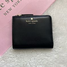 Brand New With Tag And Care Card Kate Spade Kali Wallet: - Card Pockets - Bill Pocket - Coin Compartment With Zip Closure - Clear View I.D Pocket - Kate Spade Logo Kate Spade Bifold Coin Purse, Kate Spade Compact Wallet For Everyday, Kate Spade Compact Everyday Wallet, Compact Kate Spade Wallets As Gifts, Kate Spade Bifold Wallets For Gifts, Kate Spade Rectangular Coin Purse For Everyday, Kate Spade Classic Compact Wallet, Classic Compact Kate Spade Wallet, Kate Spade Everyday Bifold Bag