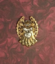 Guardian Angel Pin #225  This angel pin is available in antique gold with contrasting accents.  Size: 1 1/4"x 1"  #angel  #angelpin Gold, Design