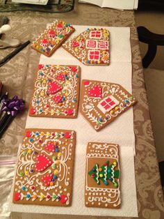 several decorated cookies on a table ready to be eaten