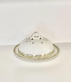 a white platter sitting on top of a table