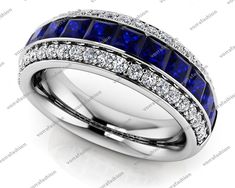 a wedding ring with blue sapphire stones and white diamonds on the sides, set in 18k white gold