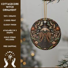 a christmas ornament with an image of a witch hanging from a tree branch