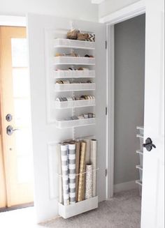 a white closet filled with lots of storage