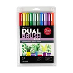 the dual brush pen set includes four different colors and is packaged in a plastic package